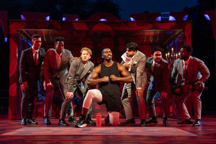 Khris Davis (center) and members of the ensemble in the Free Shakespeare in the Park production of 'Twelfth Night,' directed by Saheem Ali, which has reopened the revitalized Delacorte Theater and runs through Sept. 14.