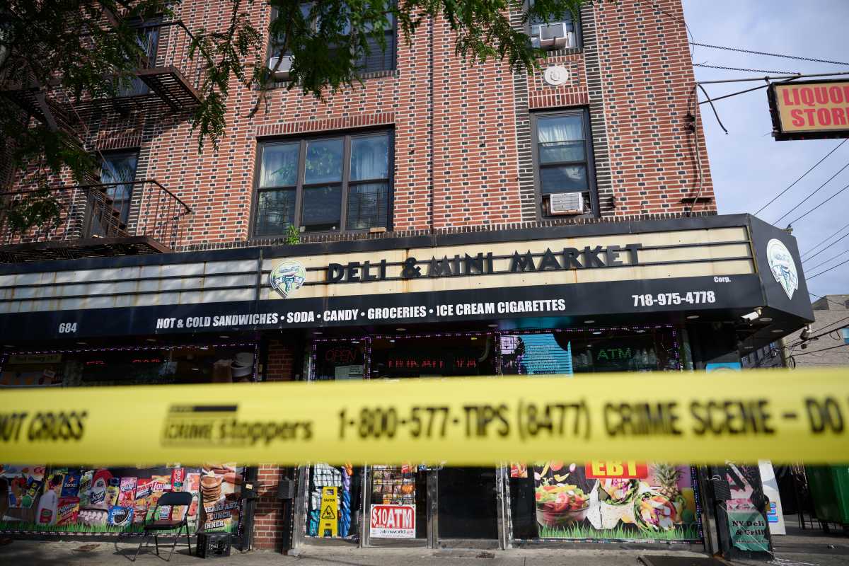 Murders in Brooklyn: Bodega worker stabbed dead in store, man shot in separate incidents 2 storefront in Brooklyn with yellow police tape where man was killed