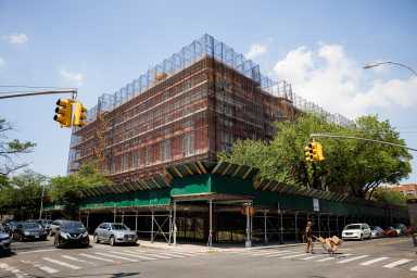 school building with construction around it in Brooklyn