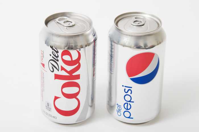 Cans of diet soda coke and pepsi