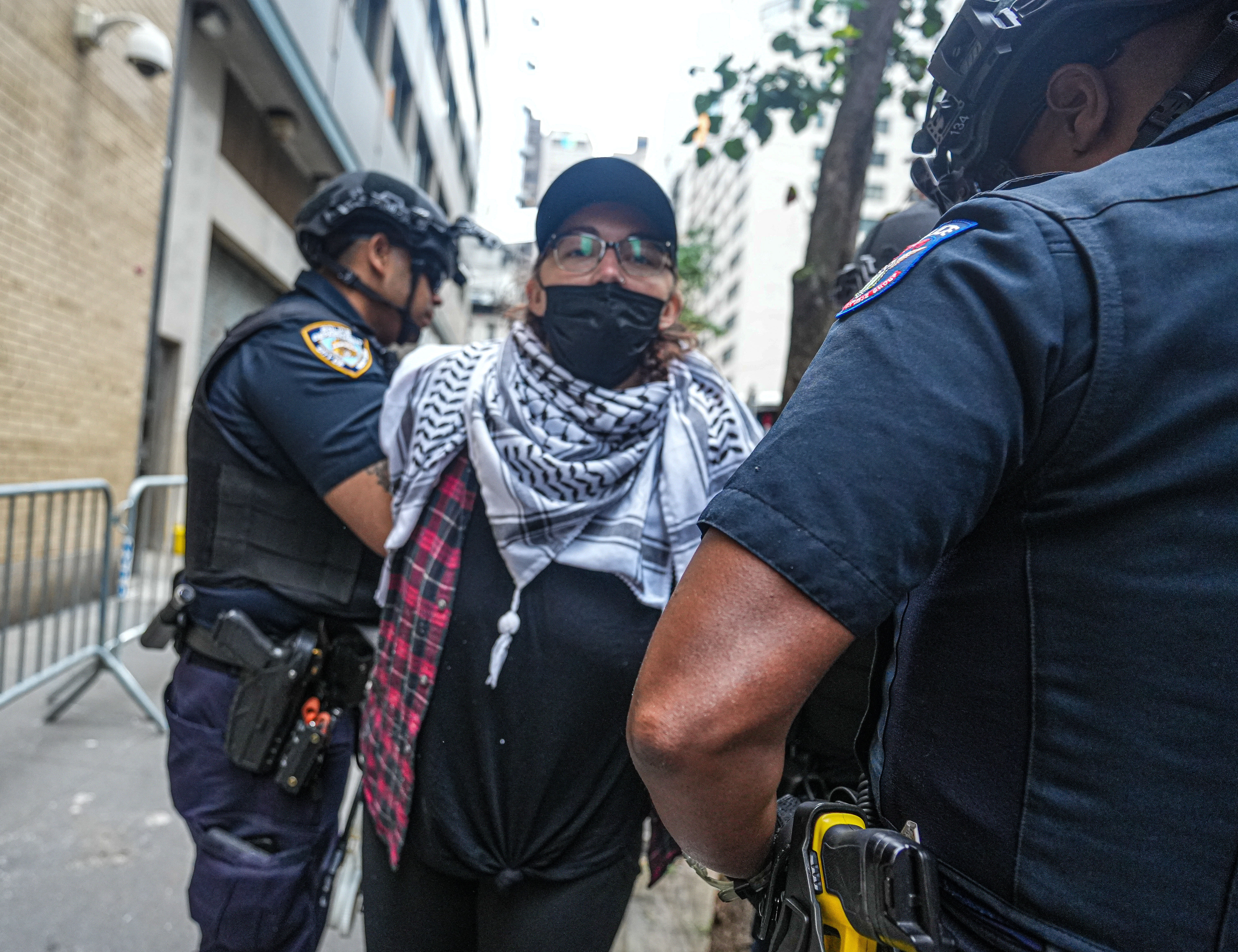 NYPD arrests a protester in Midtown.