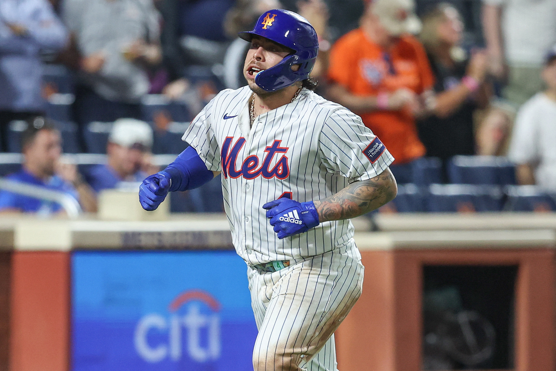 Mets player Francisco Alvarez celebrates after hitting a home run