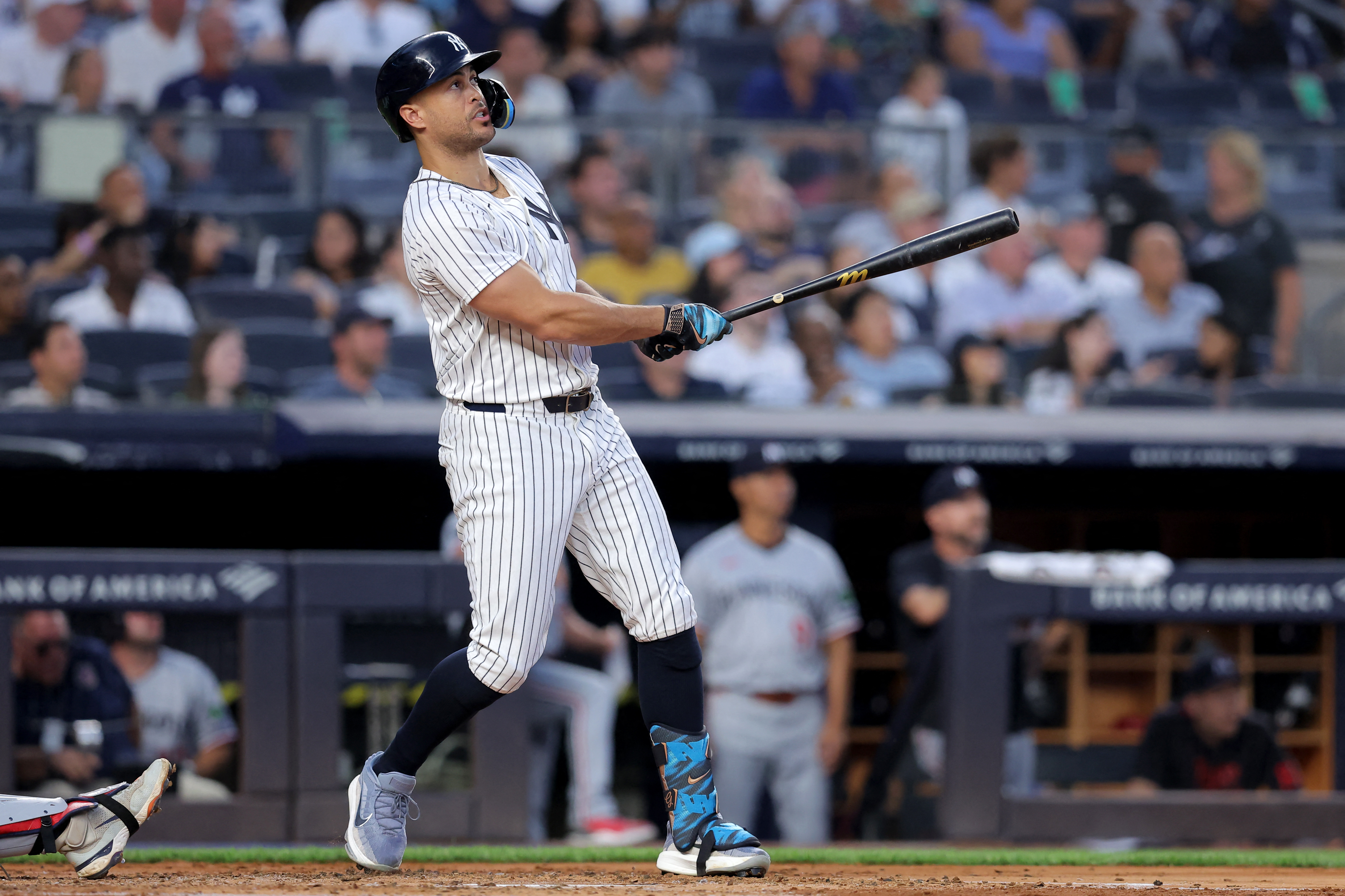 Giancarlo Stanton Yankees home run: Man in white uniform watches ball after making contact