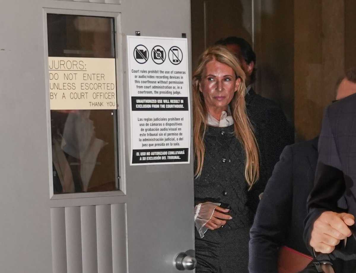 woman indicted in corruption scheme with Ingrid Lewis-Martin