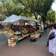 IBX Stop by Stop: Exploring the future light rail line's northern hub of Jackson Heights, a melting pot of flavors and tradition 14 a fruit stand on a sidewalk during the day