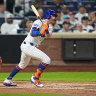 Mets' Jeff McNeil should be OK for spring training after thoracic outlet procedure 13 Jeff McNeil injury Mets: Man in white baseball uniform follows through on swing