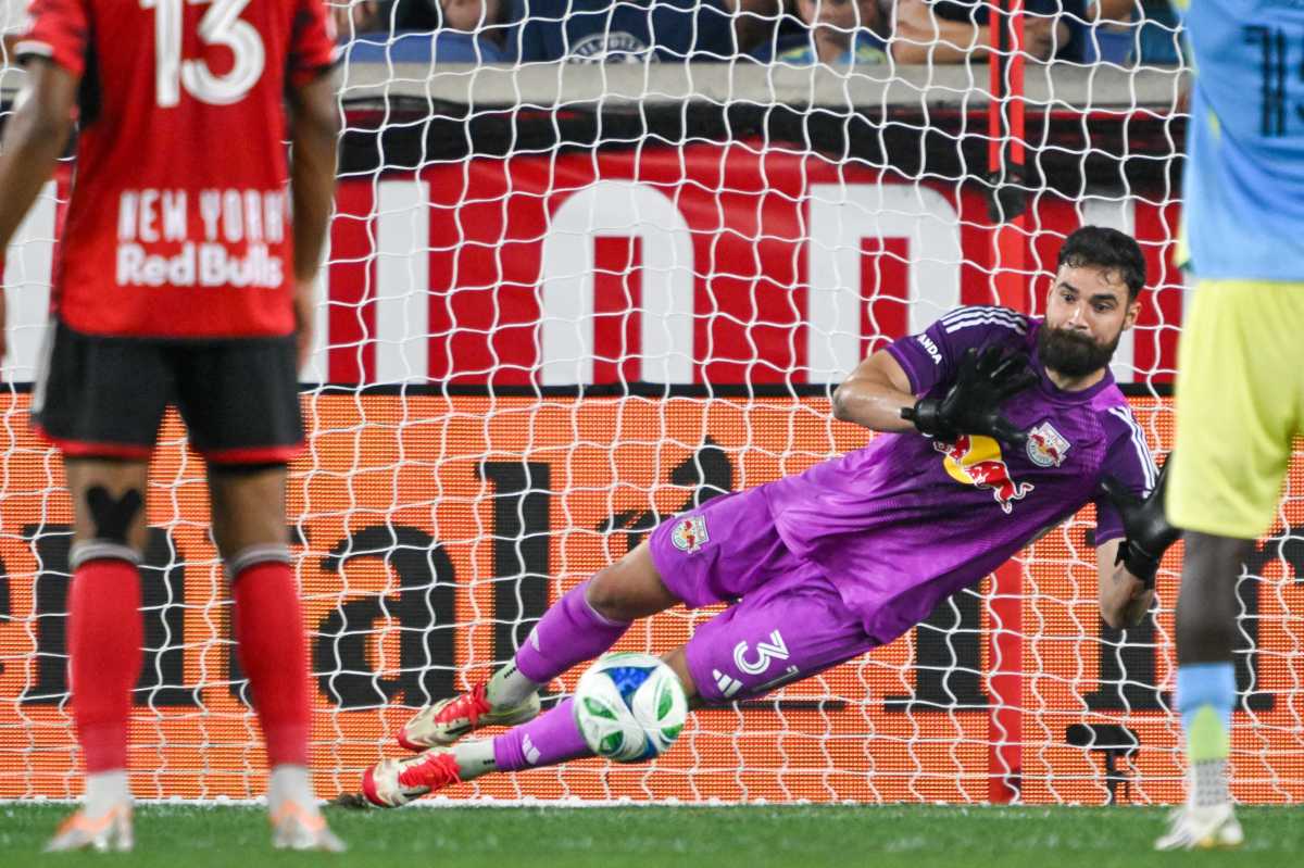 red bulls goalie makes crucial stop of soccer ball at goal