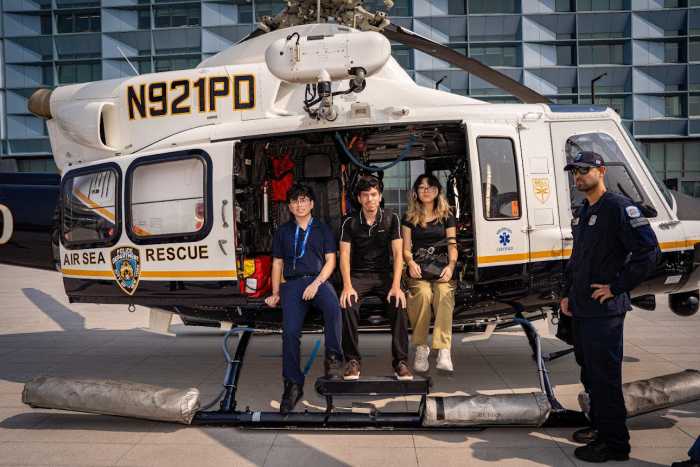 The NYPD held a career day at its police academy in Queens on Thursday for hundreds of young people involved in its summer internship program, which aims to help the most at-risk youth find meaningful career paths.