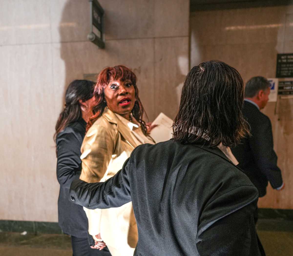 arrested Ingrid Lewis-Martin talks to reporter after her arrest