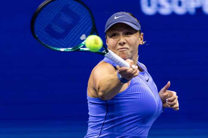 Sep 4, 2025; Flushing, NY, USA; Amanda Anisimova of the United States in action against Naomi Osaka of Japan in the semifinal of the women’s singles at the US Open at Arthur Ashe Stadium in Billie Jean King National Tennis Center.