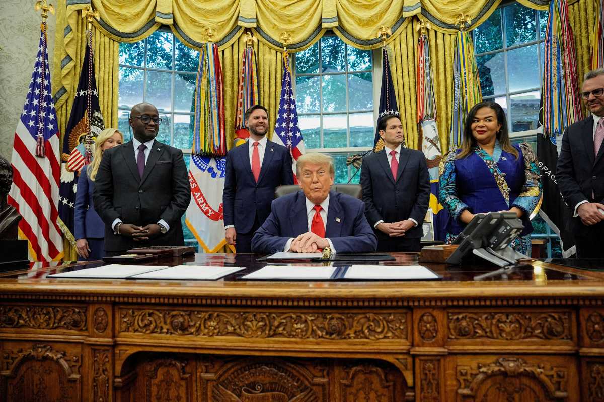NYC Mayor's Race: Eric Adams publicly expresses openness to possible Trump job offers to end campaign 2 President Trump at Oval Office desk with advisors standing nearby