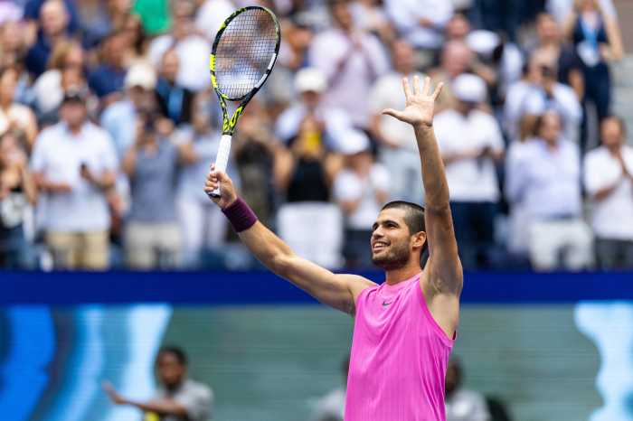 Sep 5, 2025; Flushing, NY, USA; Carlos Alcaraz of Spain celebrates his victory over Novak Djokovic of Serbia in the semifinal of the mens singles at the US Open at Arthur Ashe Stadium in Billie Jean King National Tennis Center. Mandatory Credit: Mike Frey-Imagn Images