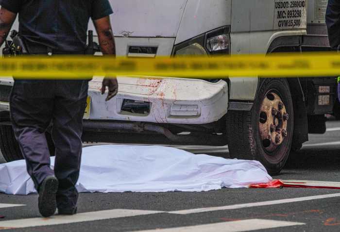 A driver was arrested after a horrific hit-and-run in Midtown left a woman decapitated.