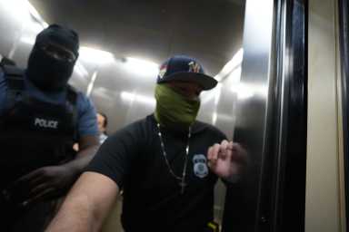 ICE agents shoving amNewYork reporter