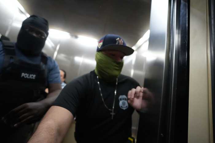 ICE agents shoving amNewYork reporter