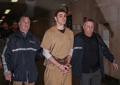 Alleged Midtown assassin Luigi Mangione marched in handcuffs by detectives into courtroom.