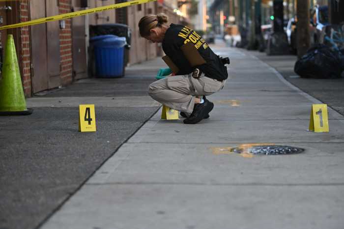 The NYPD Crime Scene Unit processes a fatal double stabbing at Ridgewood Avenue and Cresent Street.