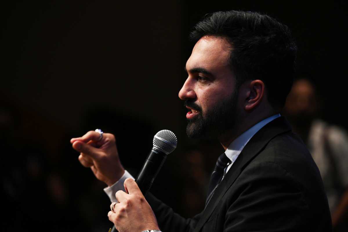 Zohran Mamdani man speaking into microphone during mayor's race