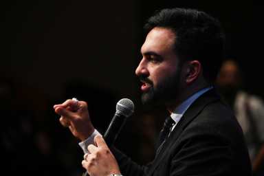 Zohran Mamdani man speaking into microphone during mayor's race
