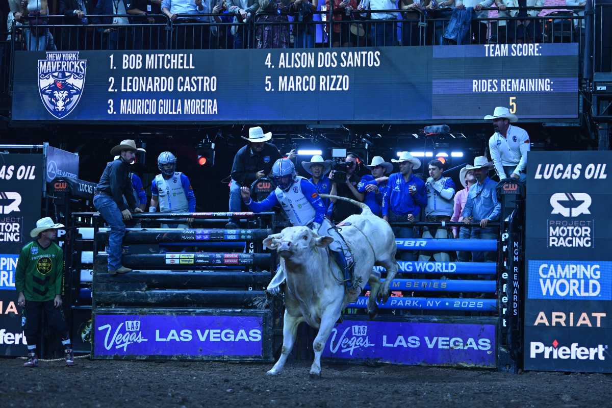New York Mavericks rider Bob Mitchell rides the bull at Maverick Days at UBS Arena.