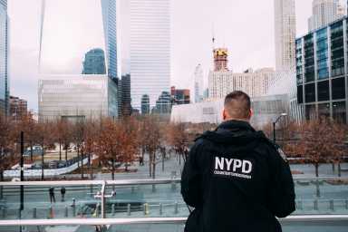 Under the proposed cuts, the NYPD faced a projected $100 million reduction