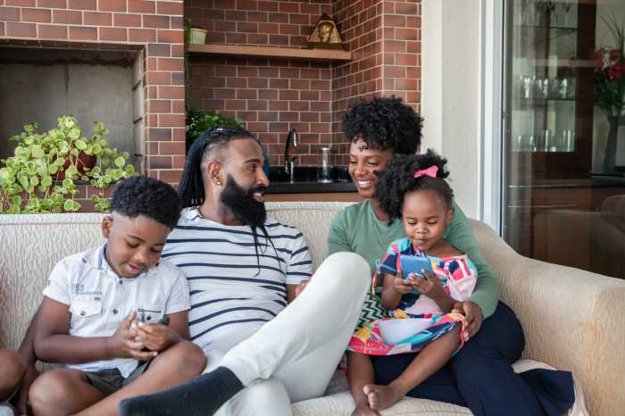 Portrait of family together at home