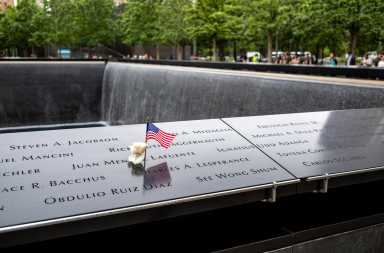 Views of the 9/11 Memorial in the financial district of lower Manhattan, New York at the site of World Trade Center. This location is considered ground zero.... the site of the former Twin Towers in Lower Manhattan. The memorial opened on September 11th 2011 and was literally constructed on the footprint of the Twin Towers. There is also a museum adjacent to the memorial. The architect, Michale Arad says that the pools of this monument are supposed to represent "the absence made visible" from this tragic event. The water flows, into the pools, but they can never be filled. the pools are a place of tranquility away from the surrounding noise of the city. At the bottom of the pool are some remaining artifacts from the destruction of the towers. The names of all of the victims from 2001 and 1993 are inscribed on bronze parapets surrounding the pools. The memorial is visited by a never ending stream of visitors from around the world.
