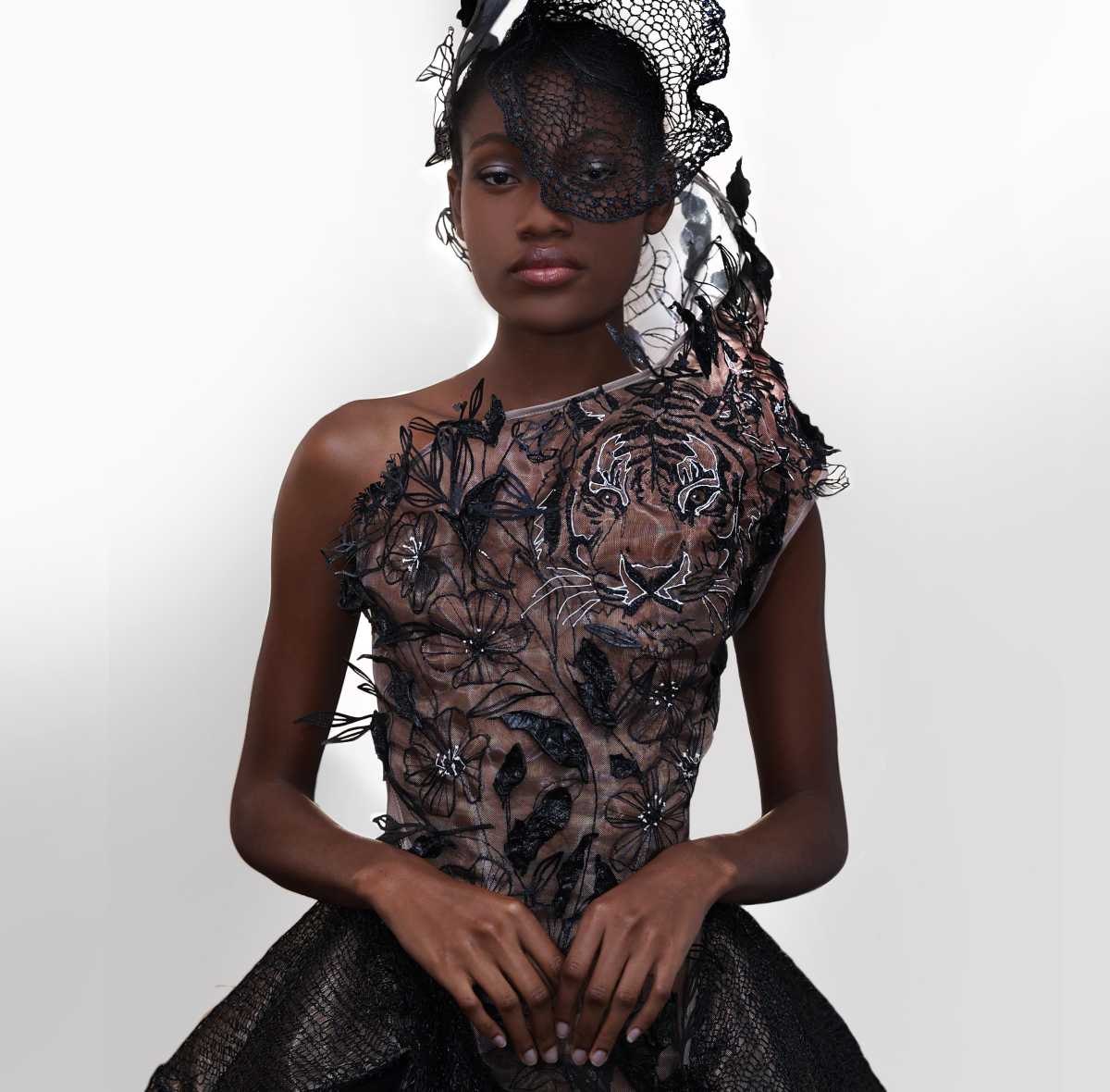Ama Ganah models Padina Bondar's tiger dress. 