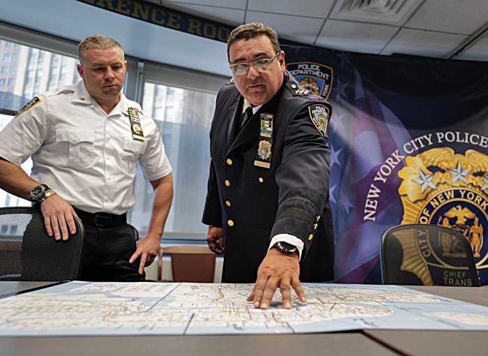 NYPD transit chief examines map while preparing security for the UN General Assembly