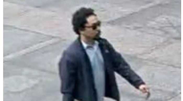 Midtown shooter Shane Tamura pictured on Jult 28 entering 345 Park Ave., which houses the NFL headquarters.