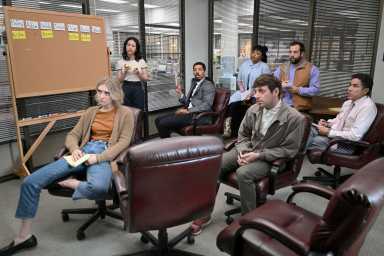 The Paper -- Episode 105 -- Pictured: (l-r) Chelsea Frei as Mare, Ramona Young as Nicole, Melvin Gregg as Detrick, Gbemisola Ikumelo as Adelola, Alex Edelman as Adam, Eric Rahill as Travis, Oscar Nunez as Oscar