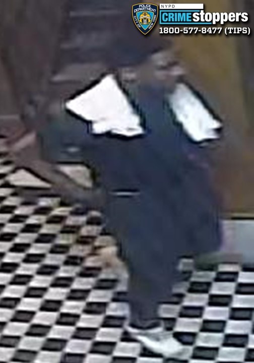 Suspect in Bronx rape case wearing towel around neck