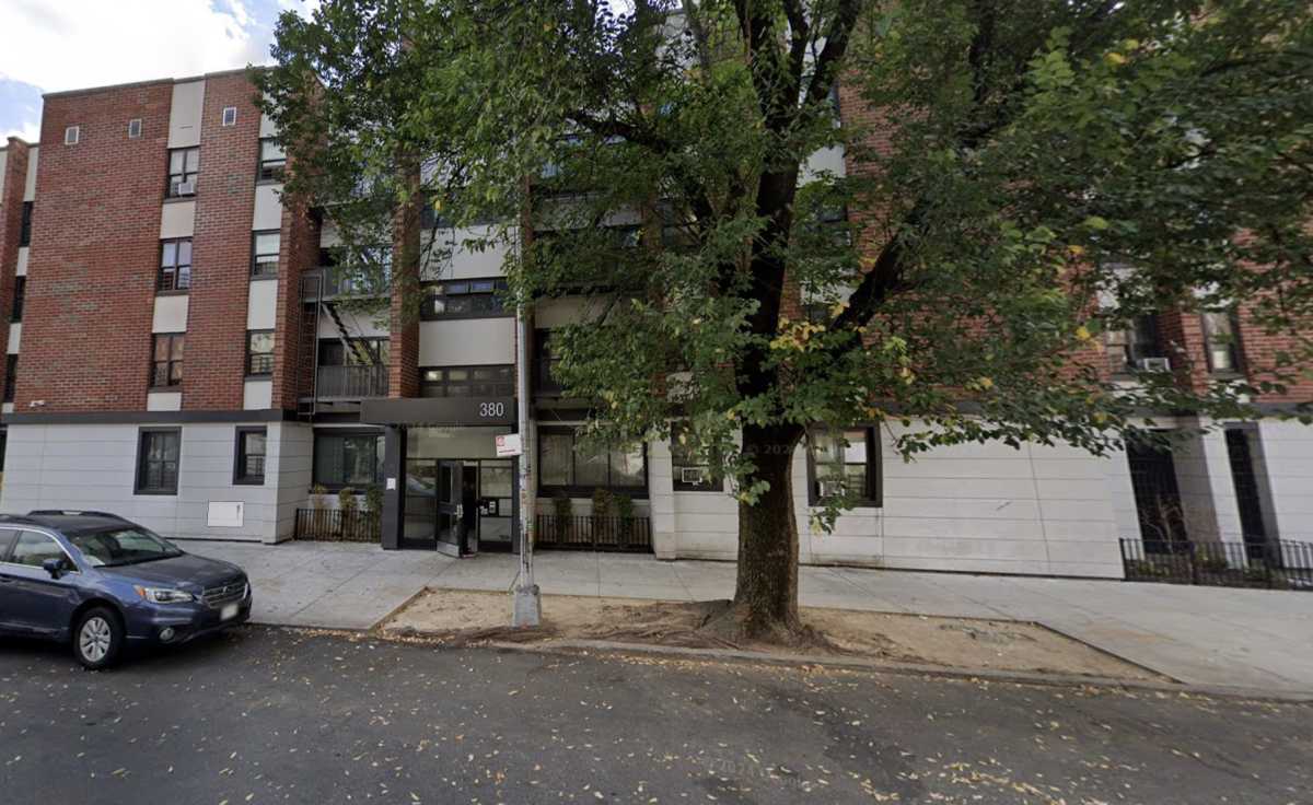 Police said a 28-year-old man was fatally shot and a woman wounded late Thursday inside this Bedford-Stuyvesant apartment building on Lexington Avenue in Brooklyn.