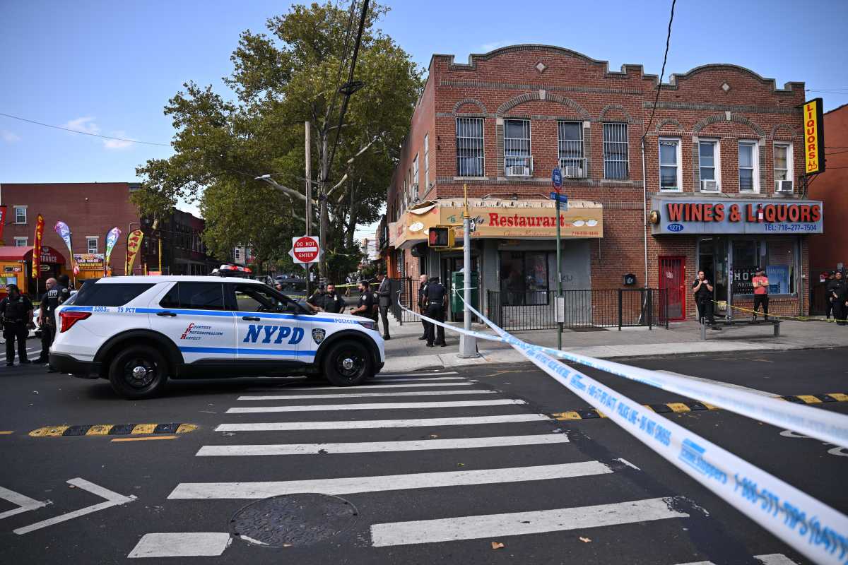 Police vehicle at scene where man was shot in Brooklyn