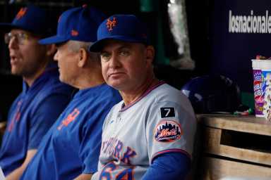 Carlos Mendoza John Gibbons Mets coaching staff grey uniforms sitting