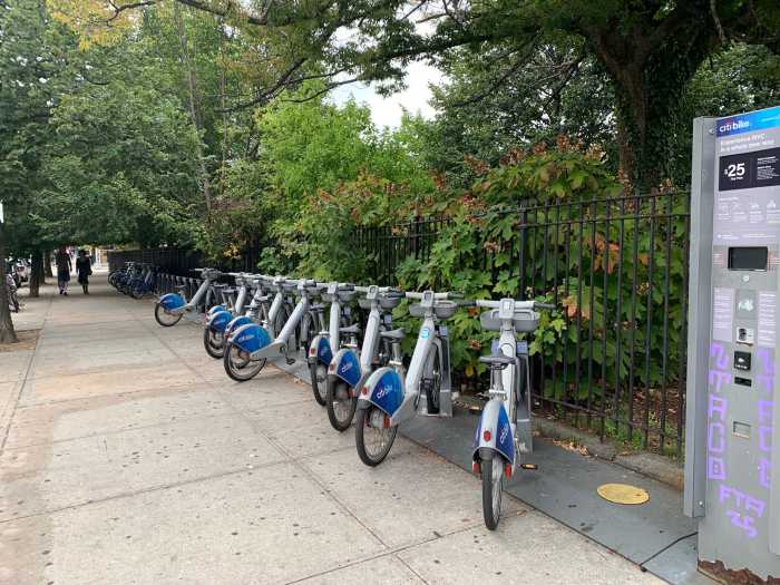 IBX Stop by Stop: A ride through Bushwick, an oasis of art, quirky bars, community spaces and a hipster vibe 4 a set of bikes next to greenery