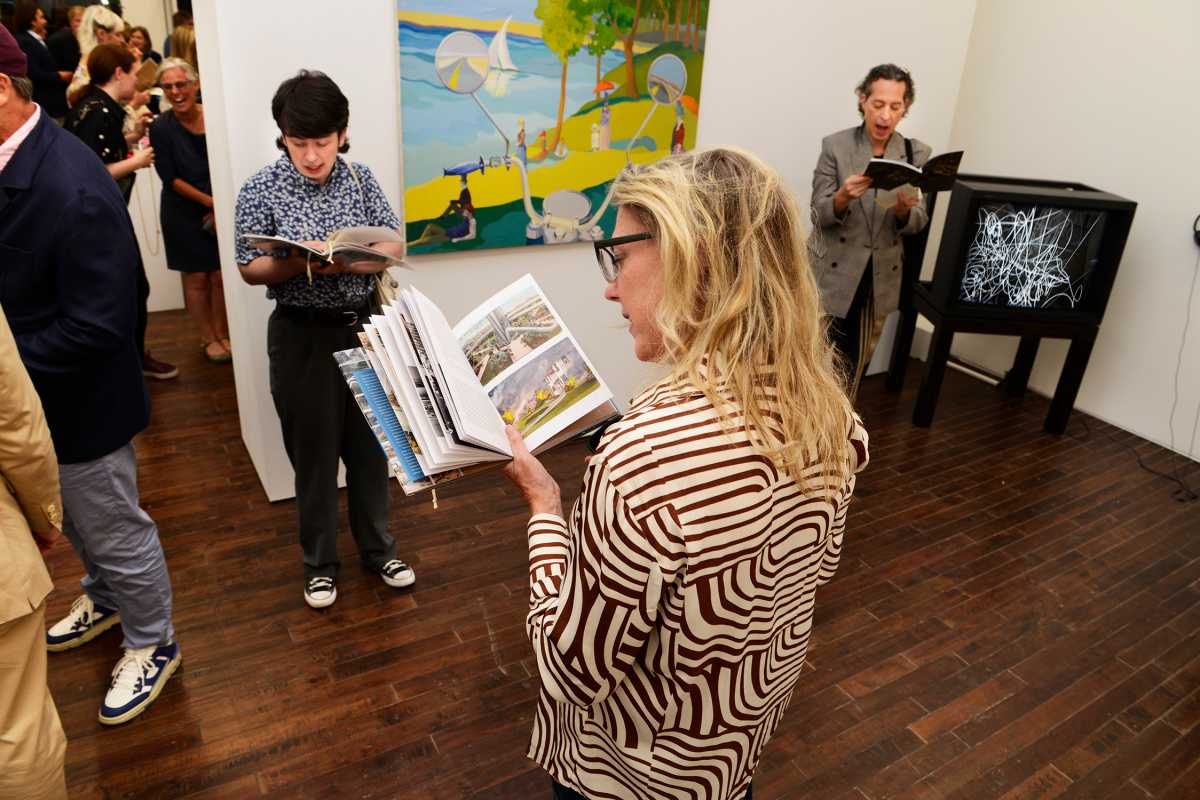 People reading aloud at Cristin Tierney Gallery in Tribeca