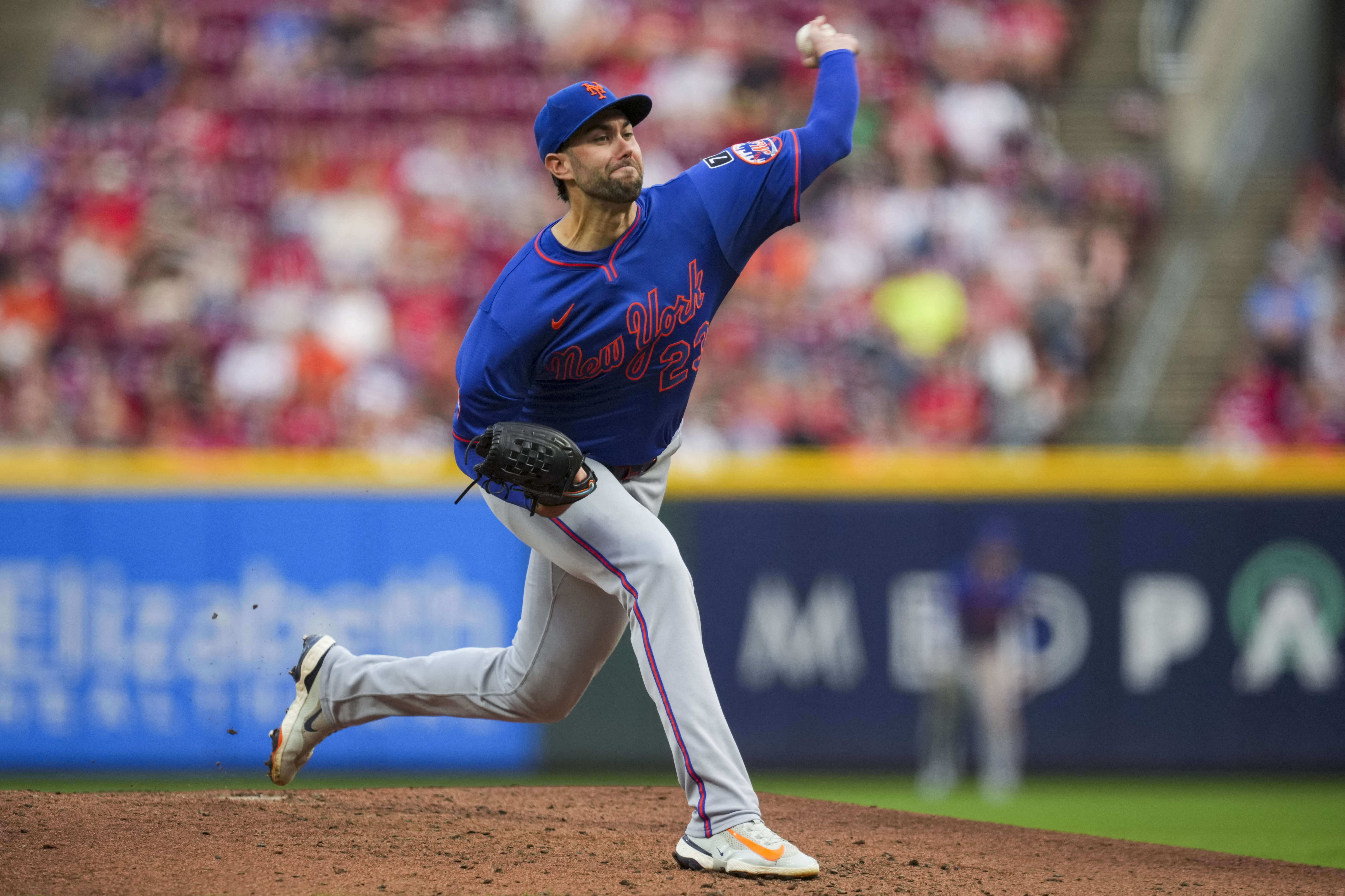 David Peterson Mets: Man in blue uniform throws baseball