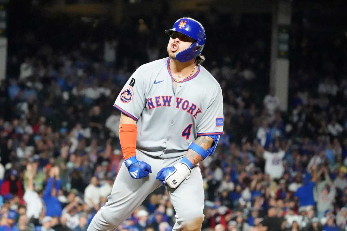 Francisco Alvarez Mets home run Cubs: Man in grey uniform flexes toward dugout after hitting home run