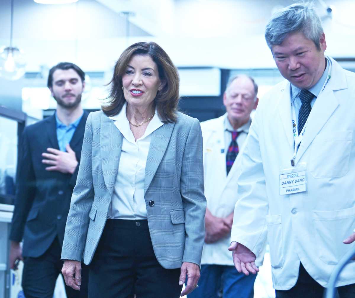 woman speaking with pharmacist