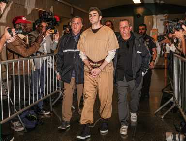 Alleged Midtown assassin Luigi Mangione marched in handcuffs by detectives into courtroom.