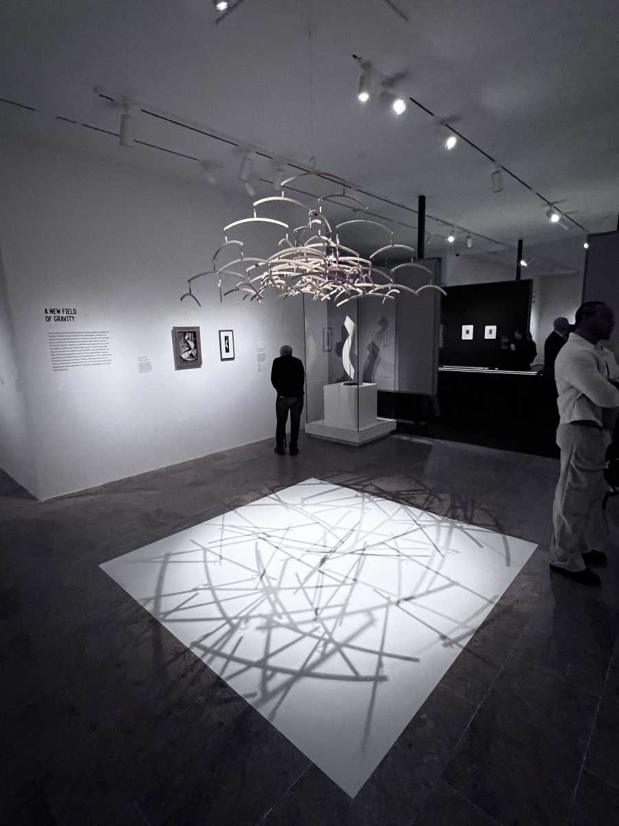 In Man Ray’s rooms at The Metropolitan Museum of Art, the hush has weight and the light thinks—slipping across paper, catching on glass, teaching objects to cast dreams instead of shadows.