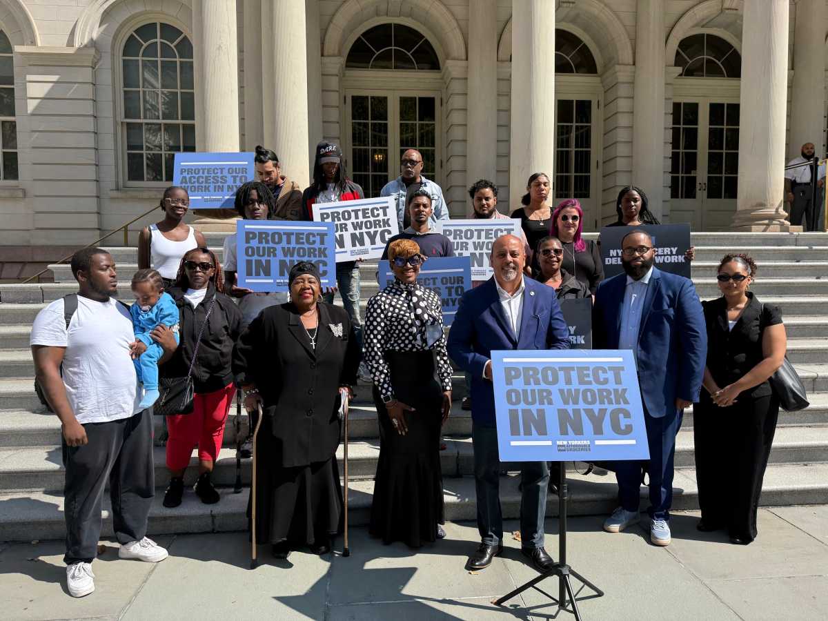 Grocery delivery workers rally at City Hall for more wages and flexible hours