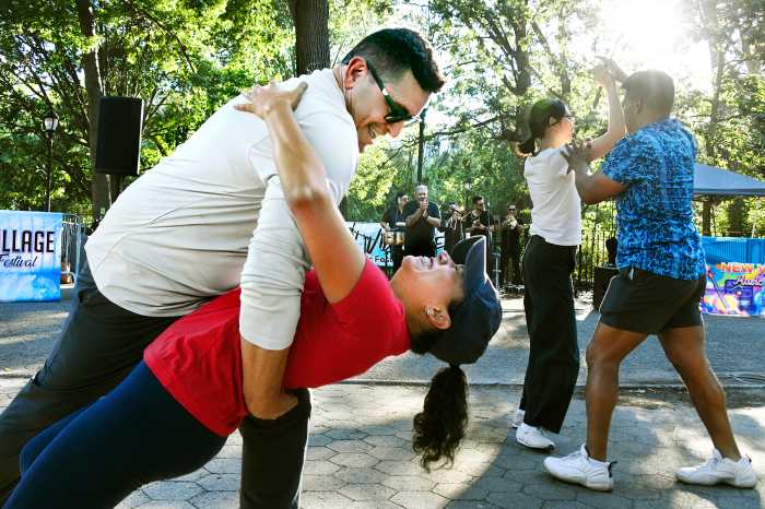 couple dipping during dance at East Village Tompkins Square Park