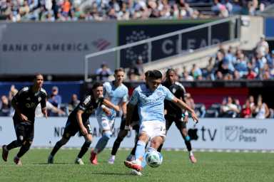 NYCFC Charlotte penalty Alonso Martinez: Man in blue uniform kicks ball