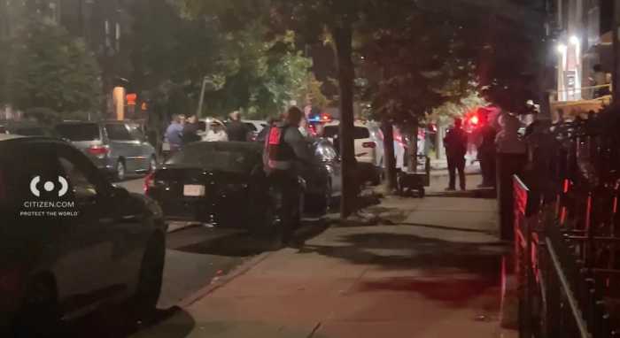 Police at Queens scene where woman was shot dead