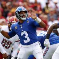 Russell Wilson will start for Giants Week 2 vs. Cowboys 42 Russell Wilson Giants: Man in blue football uniform and helmet throws ball