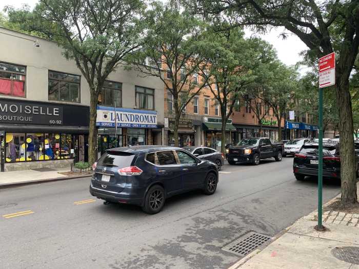 storefronts along a street in Glendale and Ridgewood where the IBX will stop