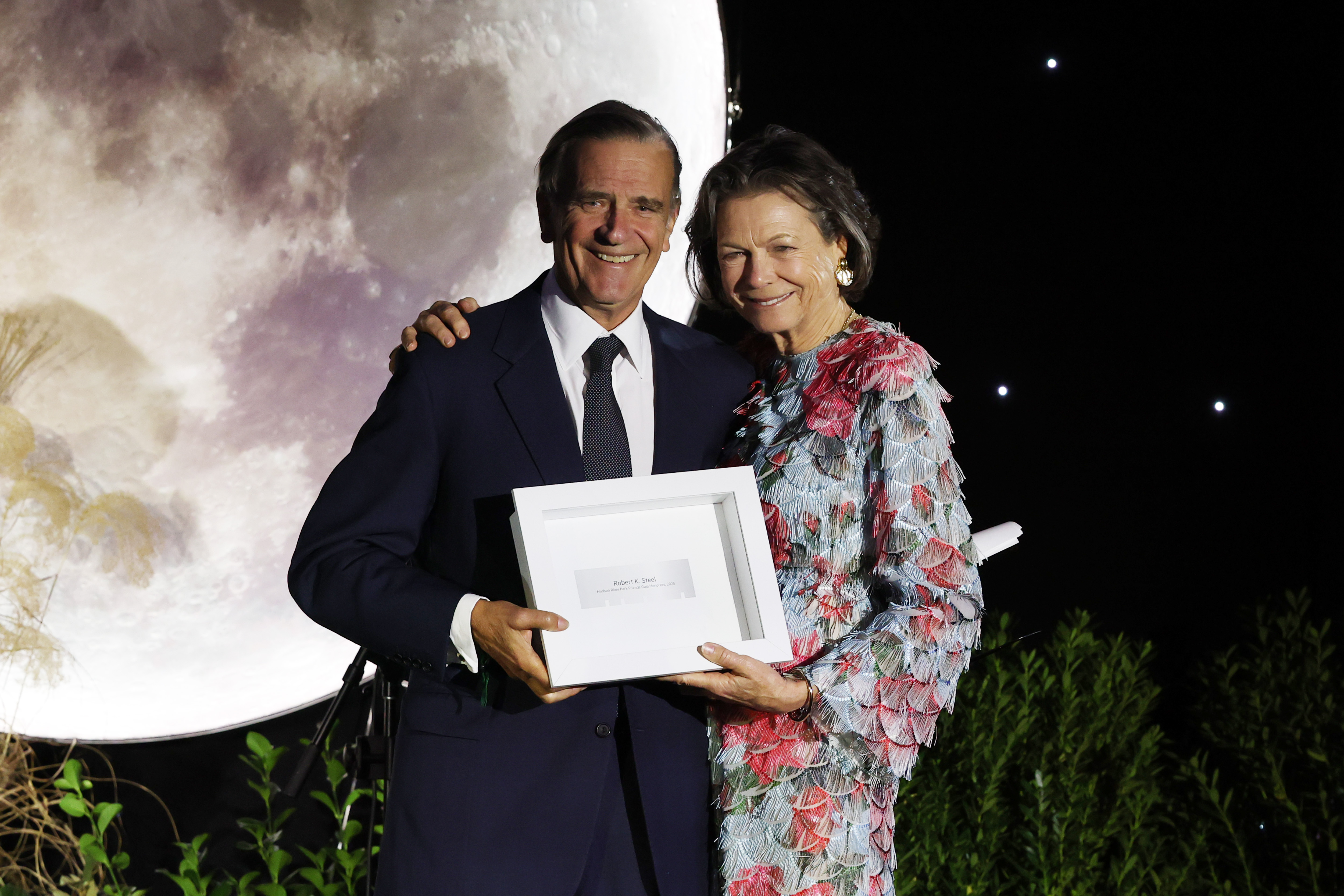 Robert K. Steel and Diana L. Taylor pose onstage at the Hudson River Park Friends 2025 Gala at Hudson River Park's Pier 62 on October 09, 2025 in New York City.