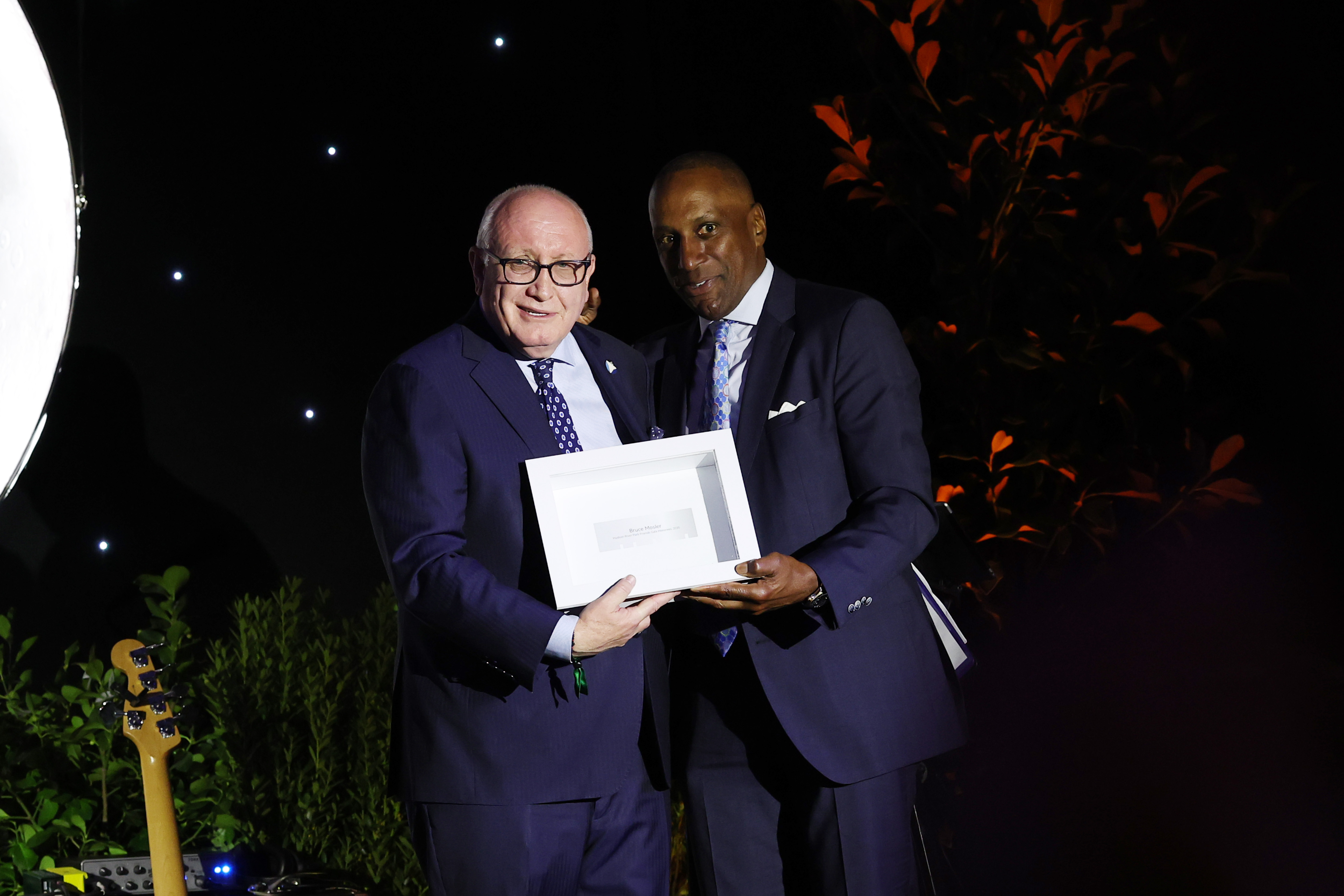 Bruce Mosler and Robert Balachandran pose onstage at the Hudson River Park Friends 2025 Gala at Hudson River Park's Pier 62 on October 09, 2025 in New York City.